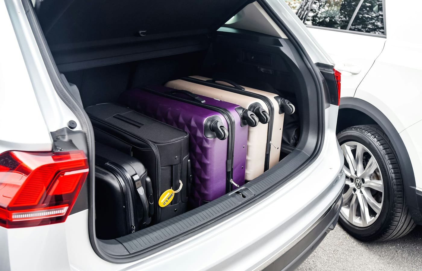 Suitcases loaded into the boot of a hatchback